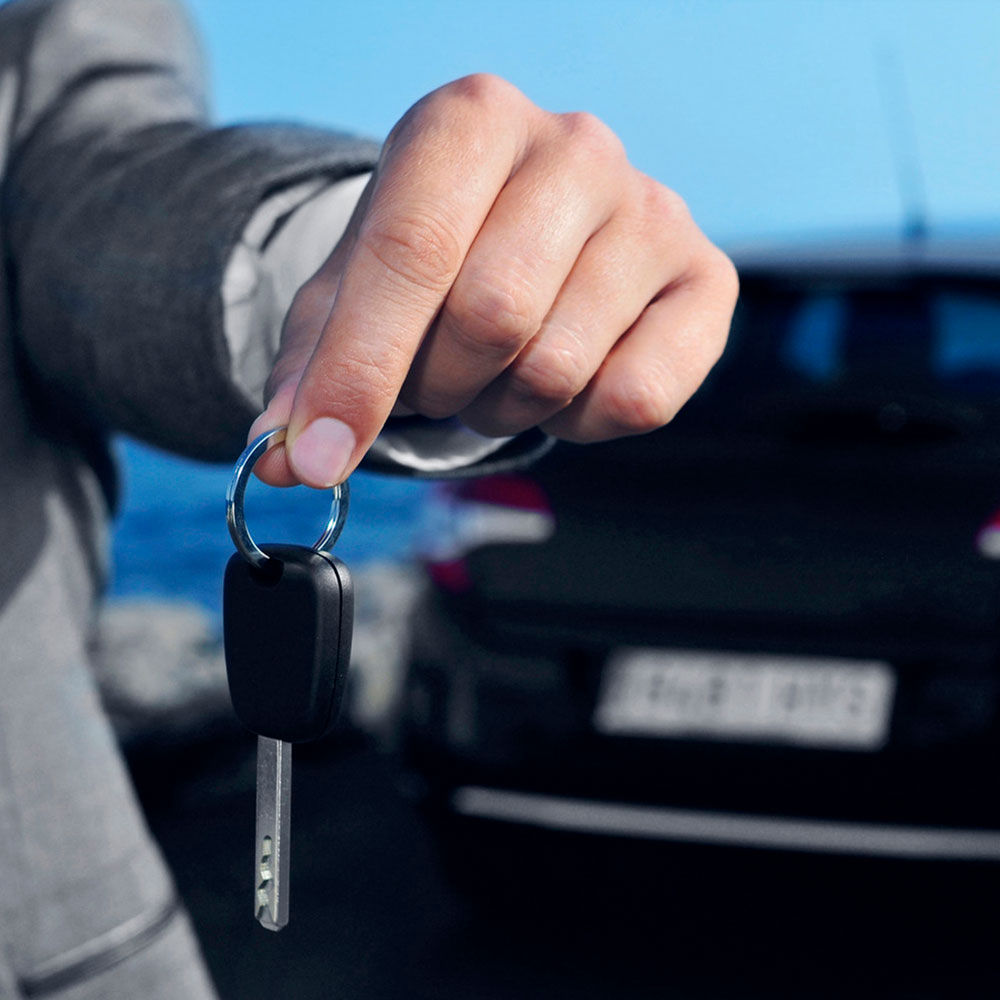 Agent giving car key