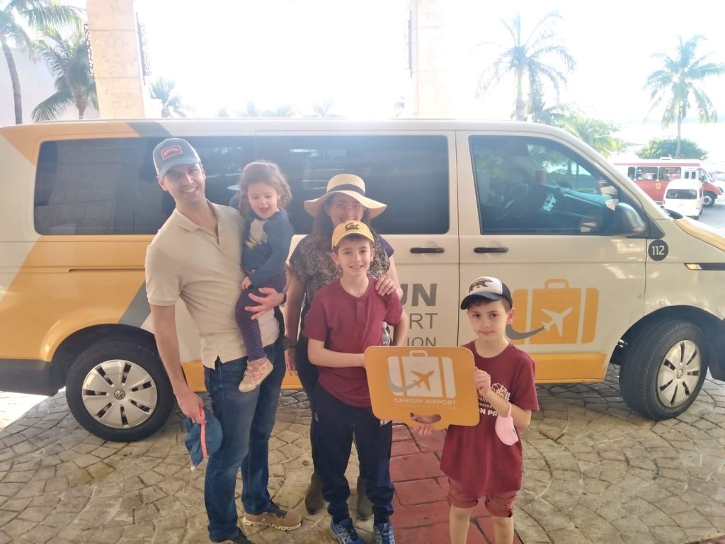 Family using Cancun Airport Transportation services