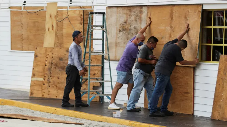 Plywood over windows in Cancun preparing for Hurricane Season